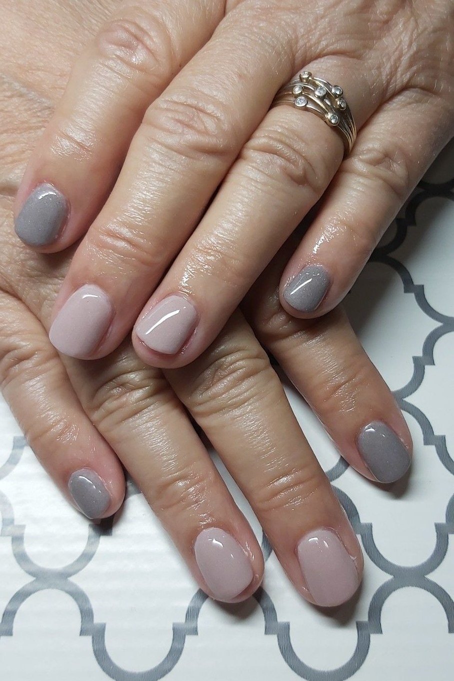 Sheer Nude With Glitter Accent Nails - flattering nail color for women over 70 on mature hands