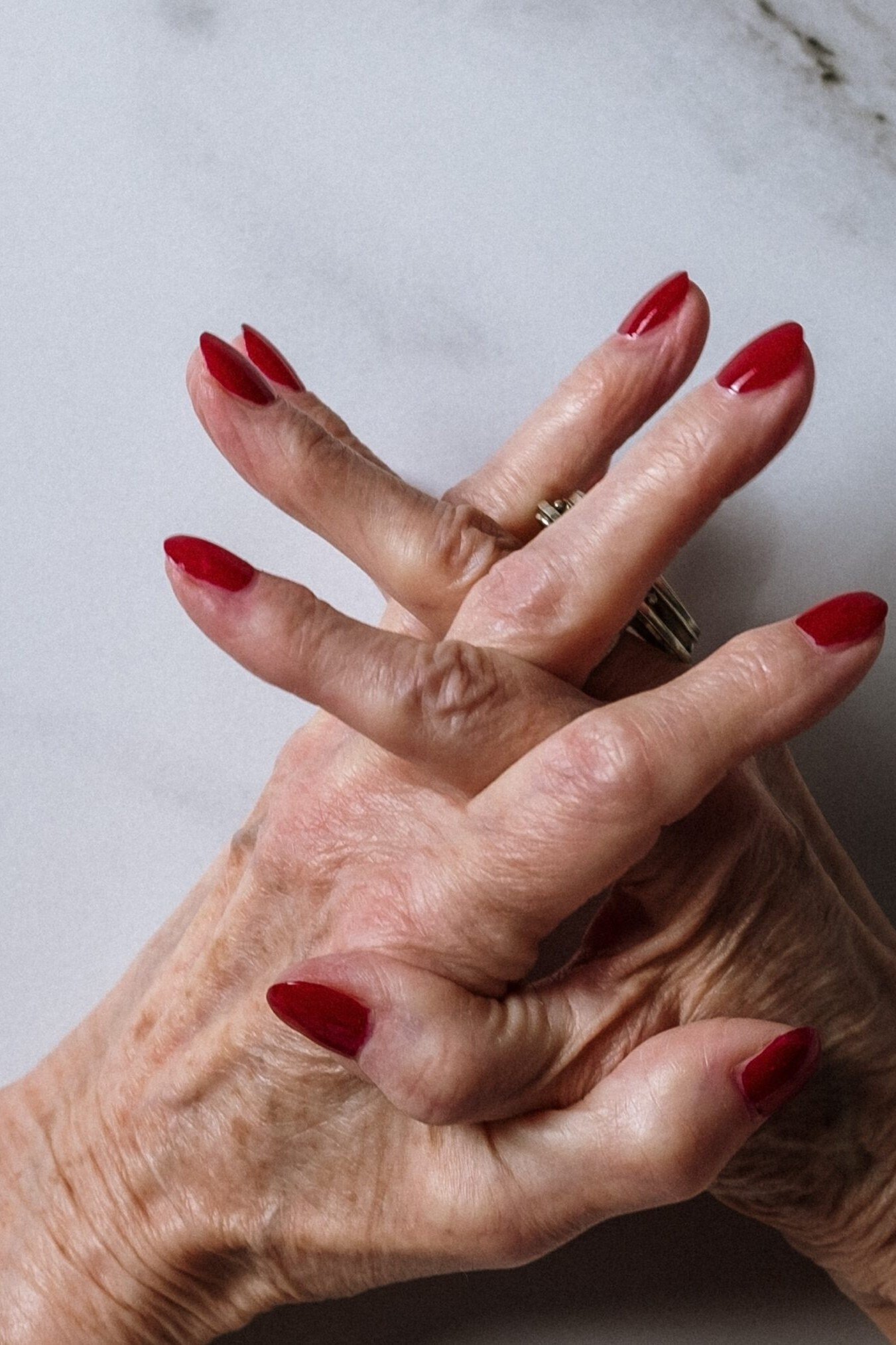 Mauve Almond Nails - flattering nail color for women over 70 on mature hands