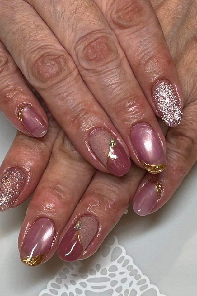 Plum Mauve Glitter Accent Nails - flattering nail color for women over 70 on mature hands