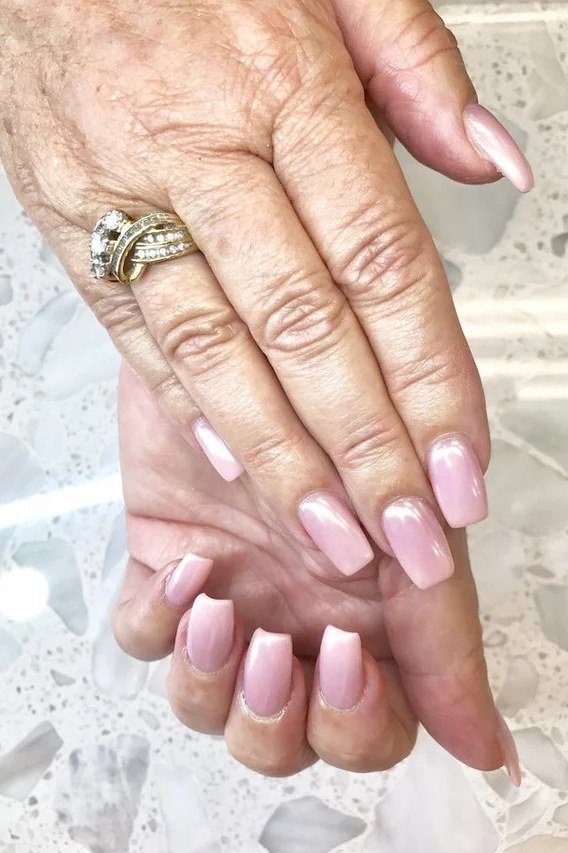 Fuchsia Raspberry Nails - flattering nail color for women over 70 on mature hands