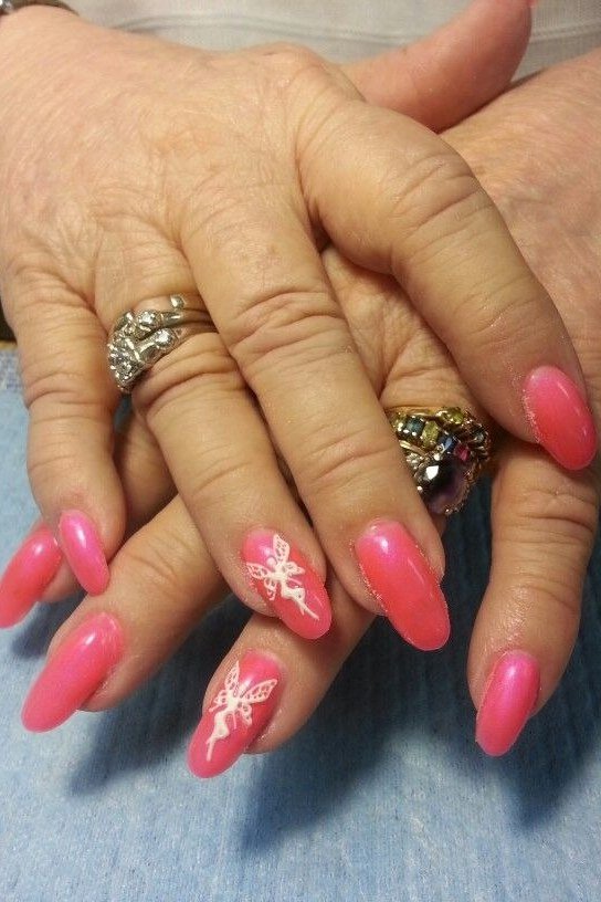 Magenta Short Nails - flattering nail color for women over 70 on mature hands