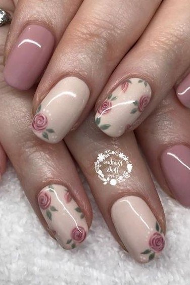 Coral Nails With Flower Accent - flattering nail color for women over 70 on mature hands