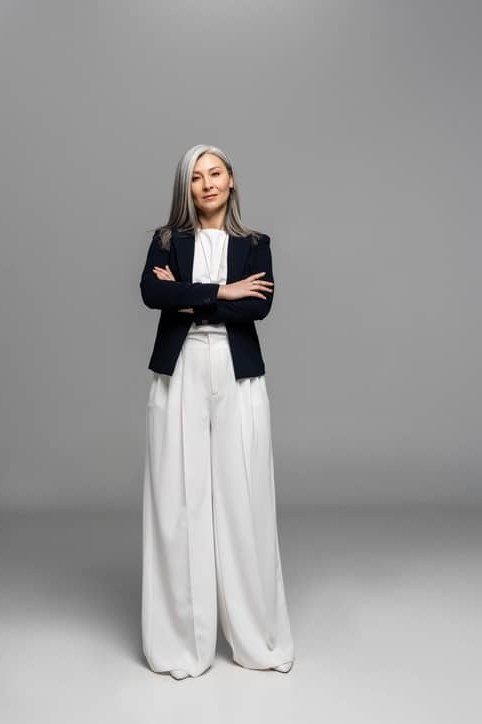 Black Blazer with White Wide Trousers - business outfit idea for women over 50