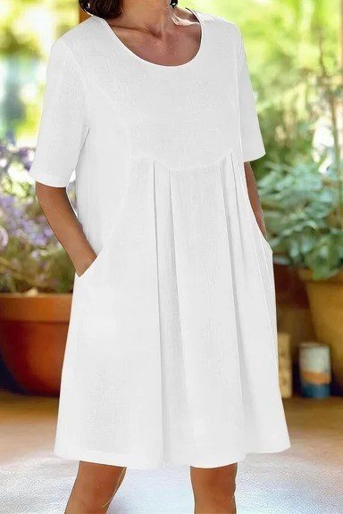 Breezy summer dress for women over 60: navy polka dot midi