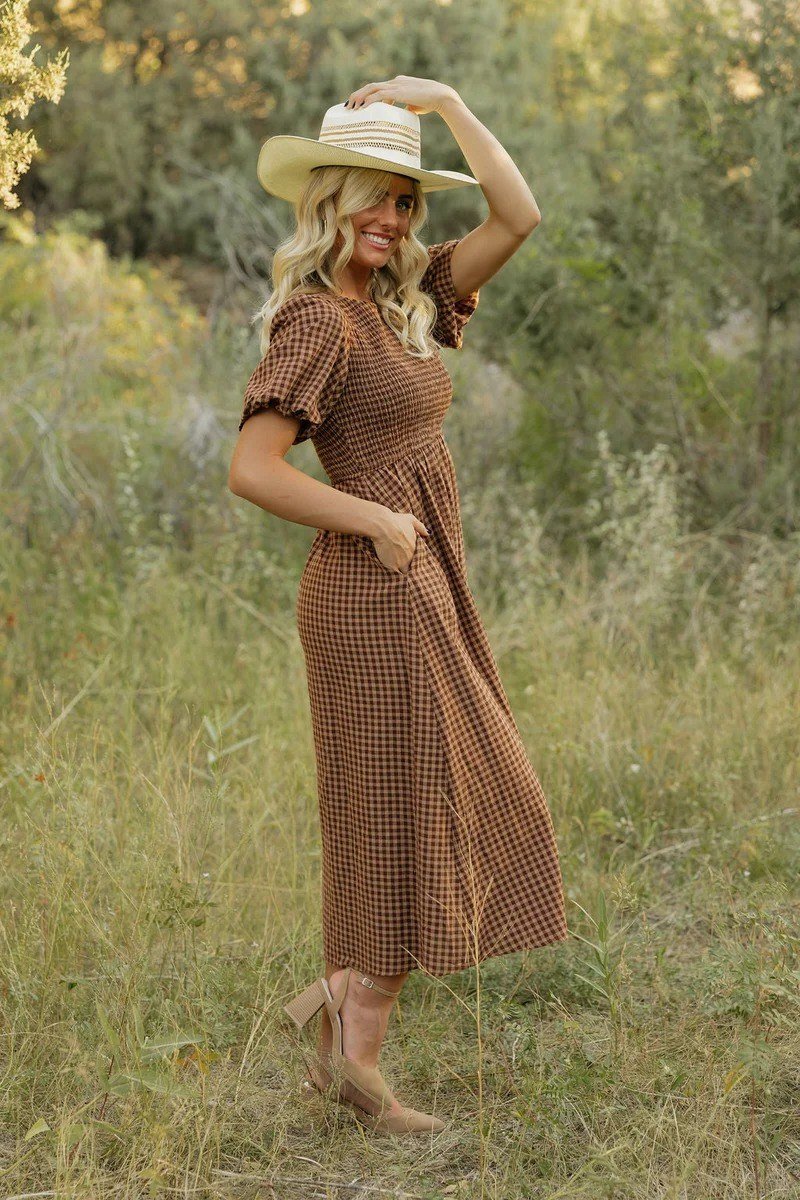Brown gingham dress with straw hat casual outfit for women over 40