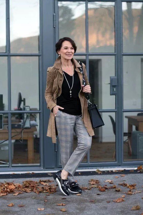 Red cardigan with blue jeans and white sneakers casual home outfit for women over 40