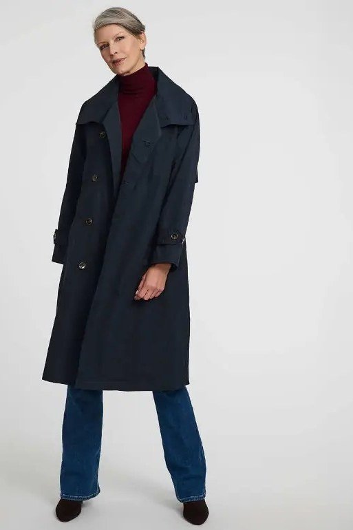 Navy trench coat with burgundy turtleneck and jeans casual outfit for women over 40