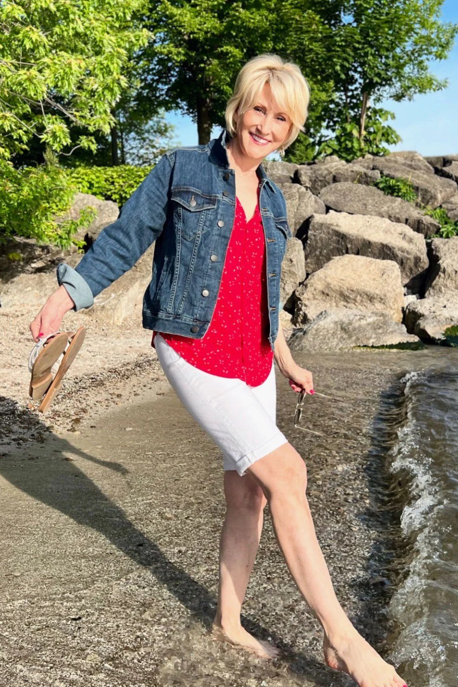 Red tee, white shorts, denim jacket, beach, casual outfit for women over 50
