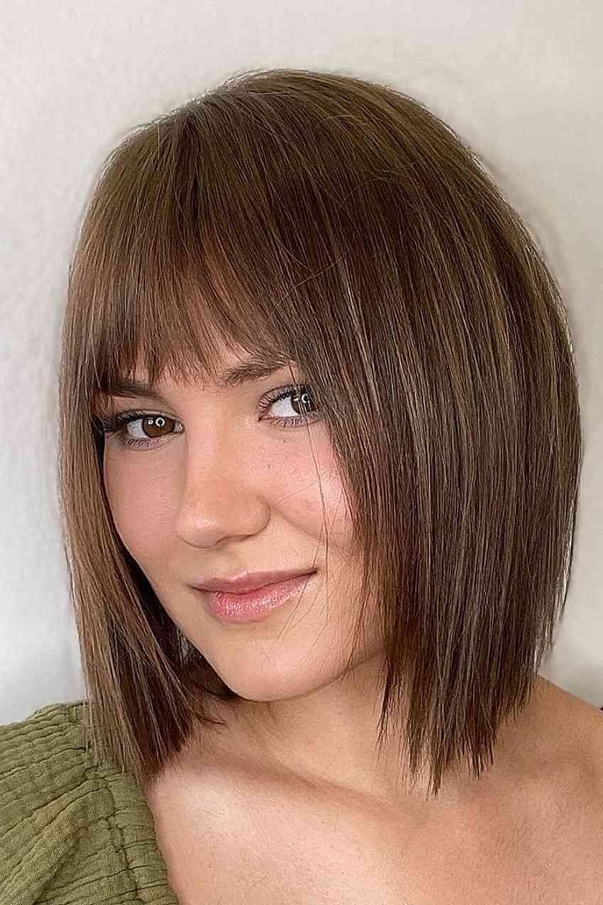 brunette straight layered bob with full bangs, three-quarter view - layered bob curtain bangs over 50, idea 16