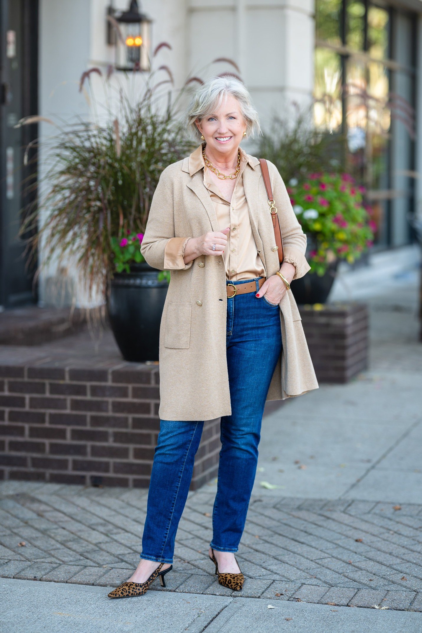 Beige Trench with Blue Jeans and Leopard Flats - classy fall outfit idea for women over 50