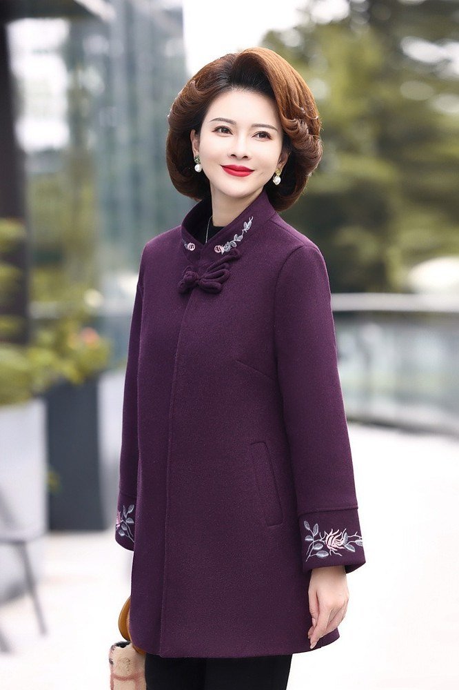 Purple Coat on a City Street - classy fall outfit idea for women over 50