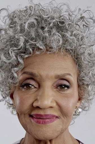 Tight grey curls for Black women over 70