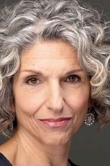 Elegant grey curly bob for women over 70