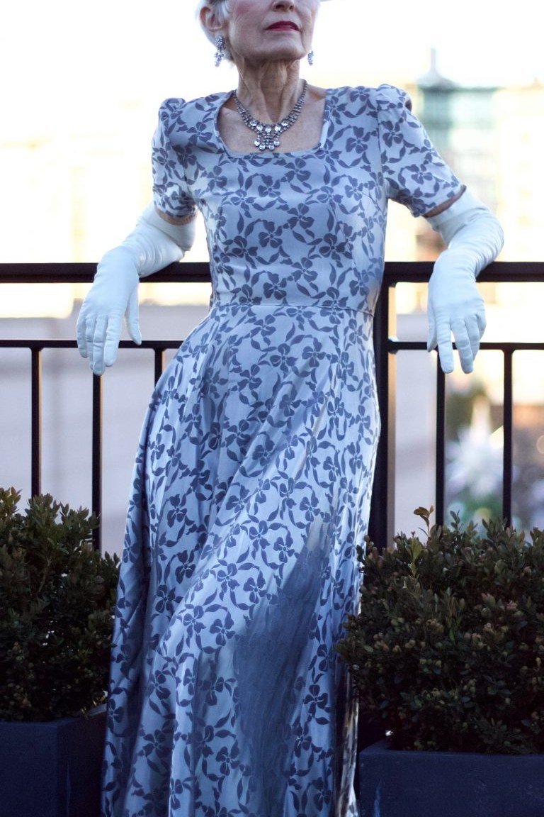 church dresses for women over 60: older woman in cornflower blue lace maxi dress