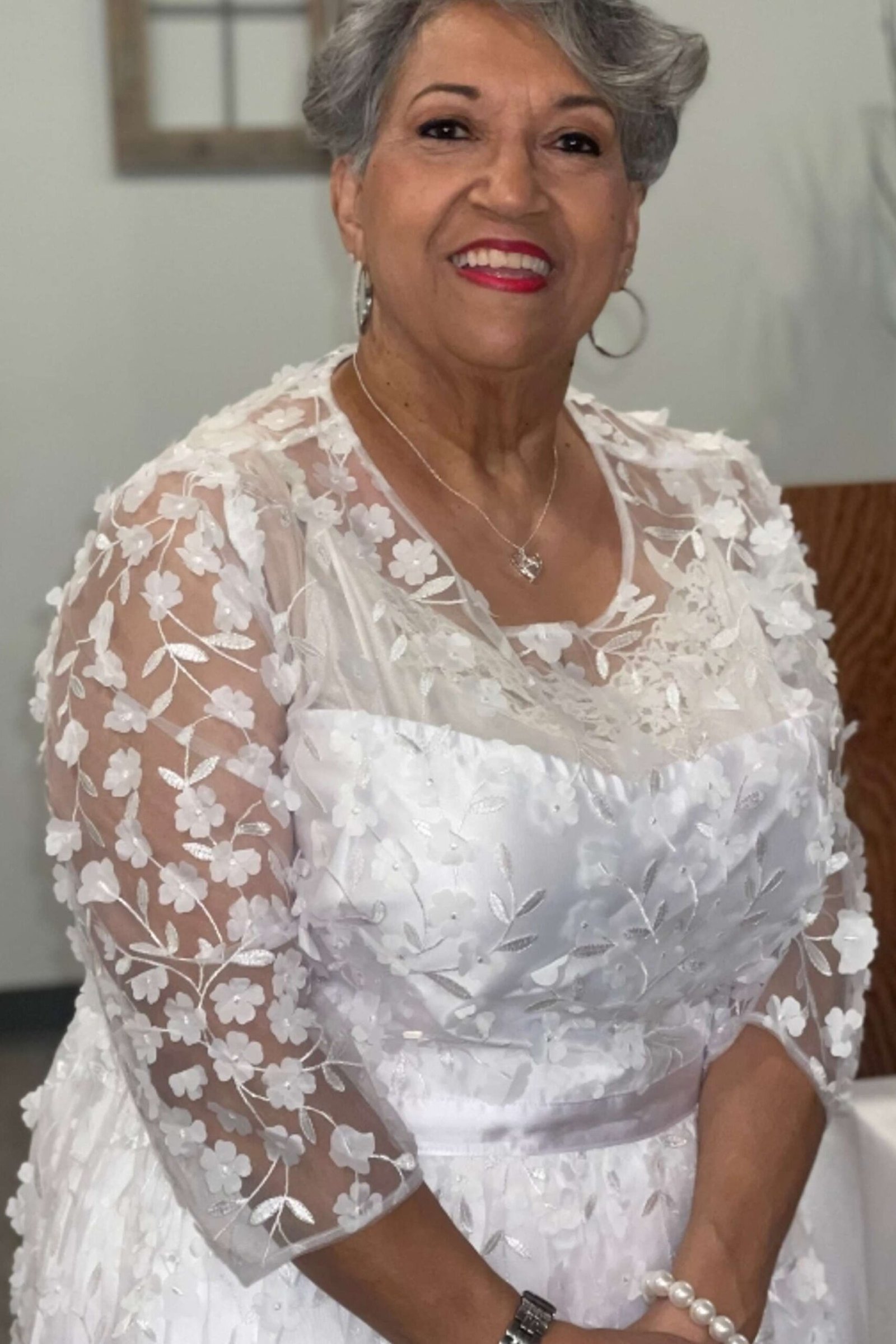 church dresses for women over 60: older woman in white floral lace midi dress