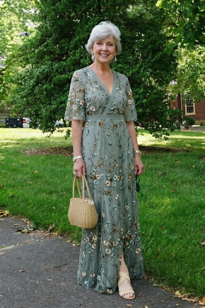 church dresses for women over 60: older woman in sage green embroidered floral maxi