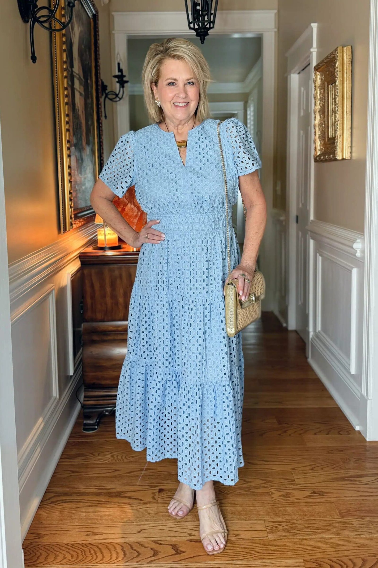 church dresses for women over 60: older woman in light blue eyelet midi dress