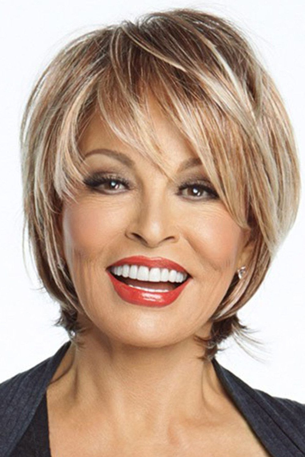 Smiling Blonde Choppy Bob with Bangs for women over 50