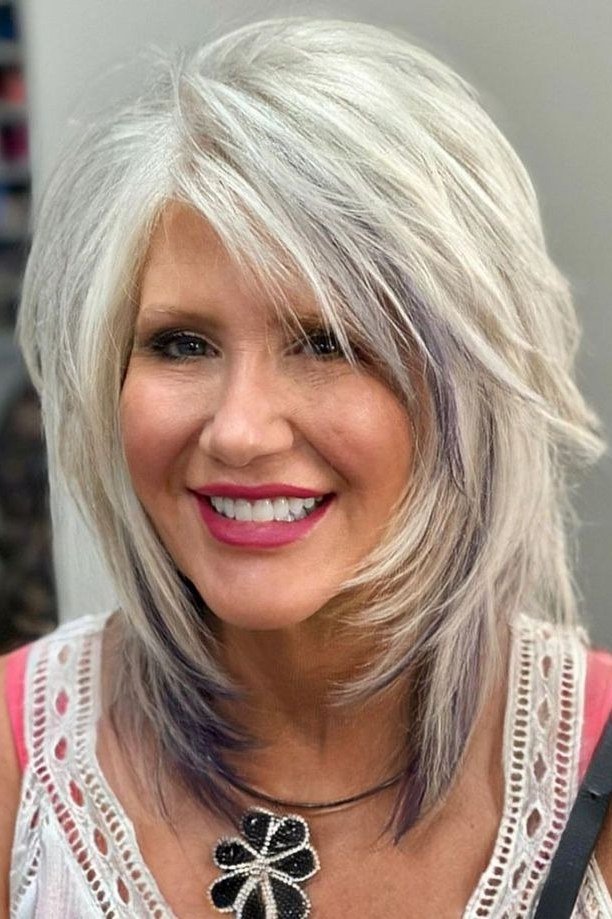 Silver Gray Choppy Lob With Feathered Bangs, a choppy hairstyle for women over 50