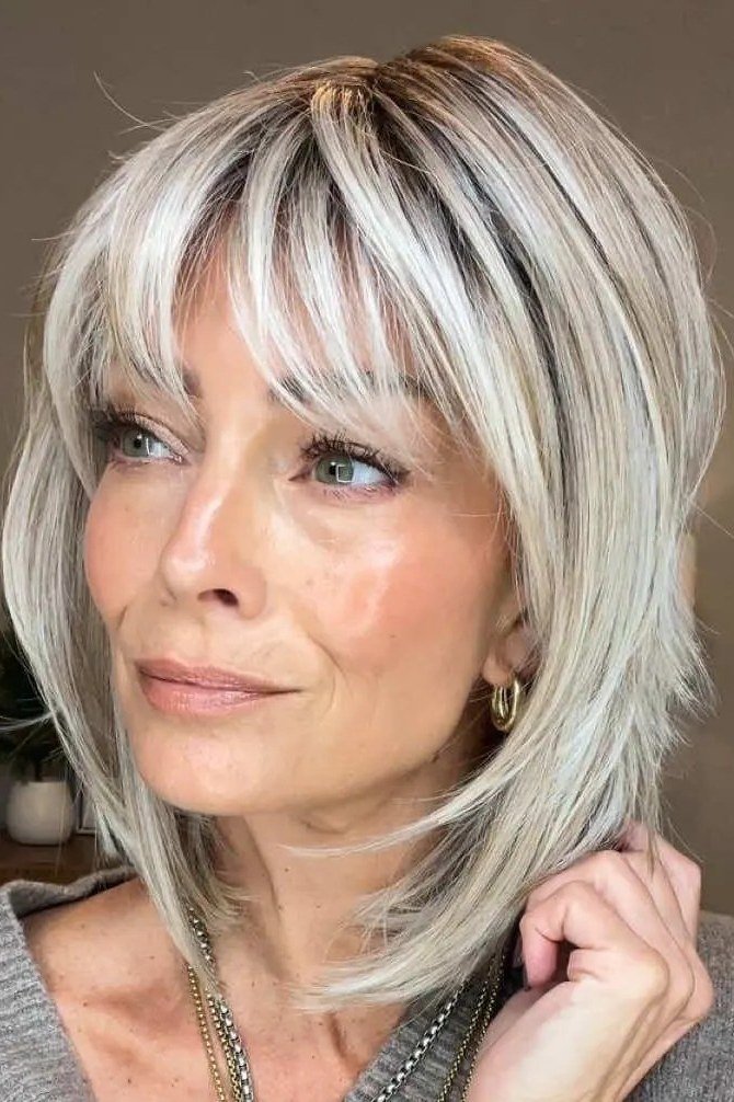 Silver choppy bob with gentle texture for women over 70