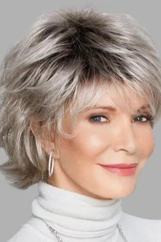 Crisp silver choppy bob haircut for older women