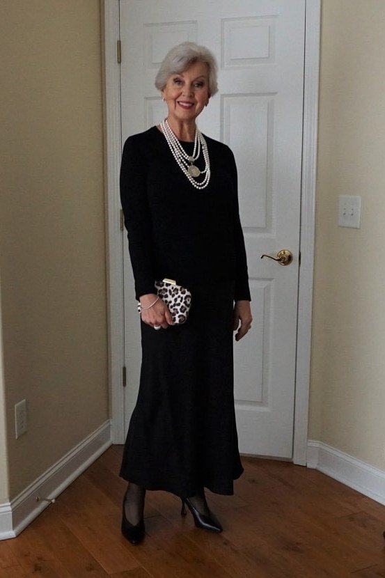 Black long-sleeve maxi dress with pearls for women over 60