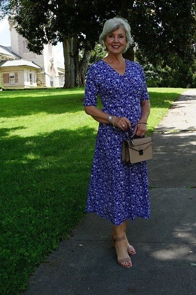 Navy blue floral midi dress, park path for women over 60