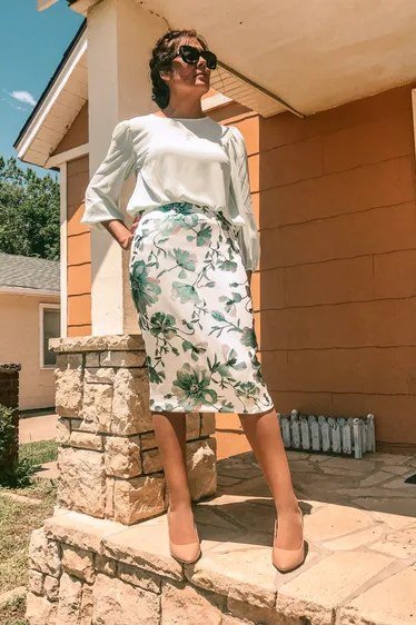 White top with green floral pencil skirt, porch for women over 60