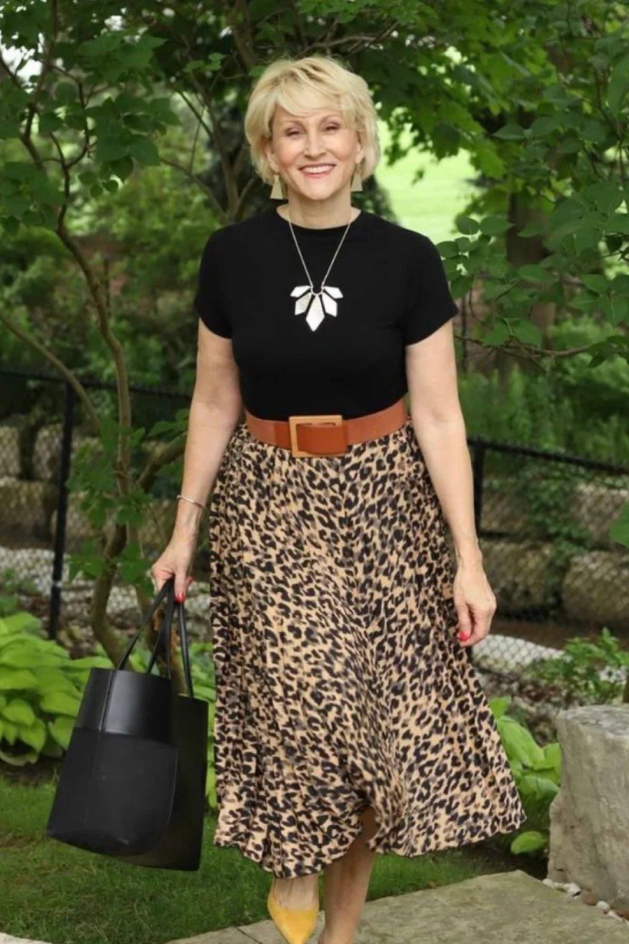 Black top + leopard midi skirt + tan belt, garden - classy outfit for women over 40