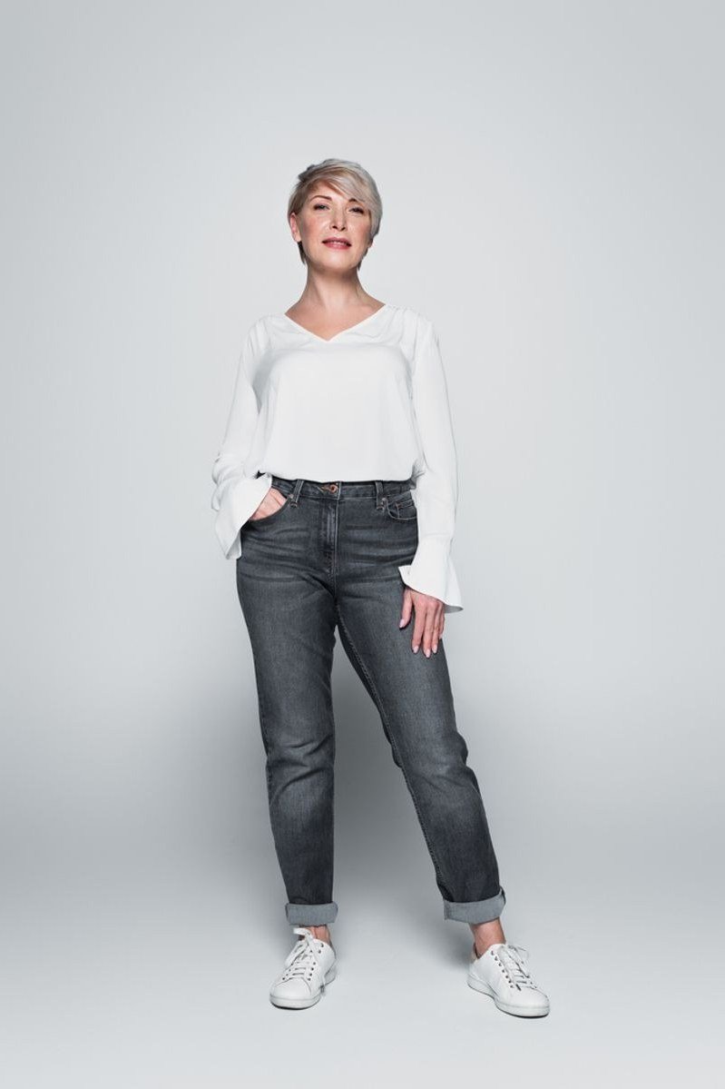 White Top With Grey Jeans and White Sneakers - classy outfit idea for women over 50