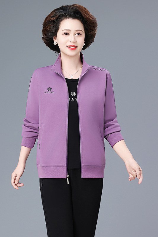 Purple sporty zip jacket with black pants, active casual outfit for women over 50
