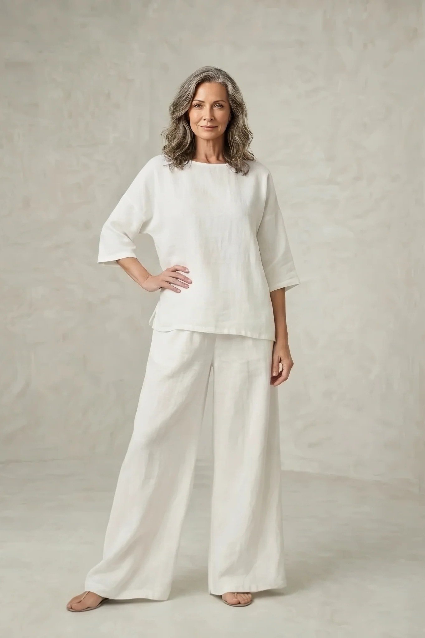 White linen three quarter sleeve tunic and wide leg pants, classy casual outfit idea for women over 60