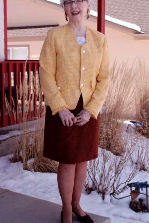 Yellow Cardigan with Burgundy Skirt - corduroy outfit idea for women over 50