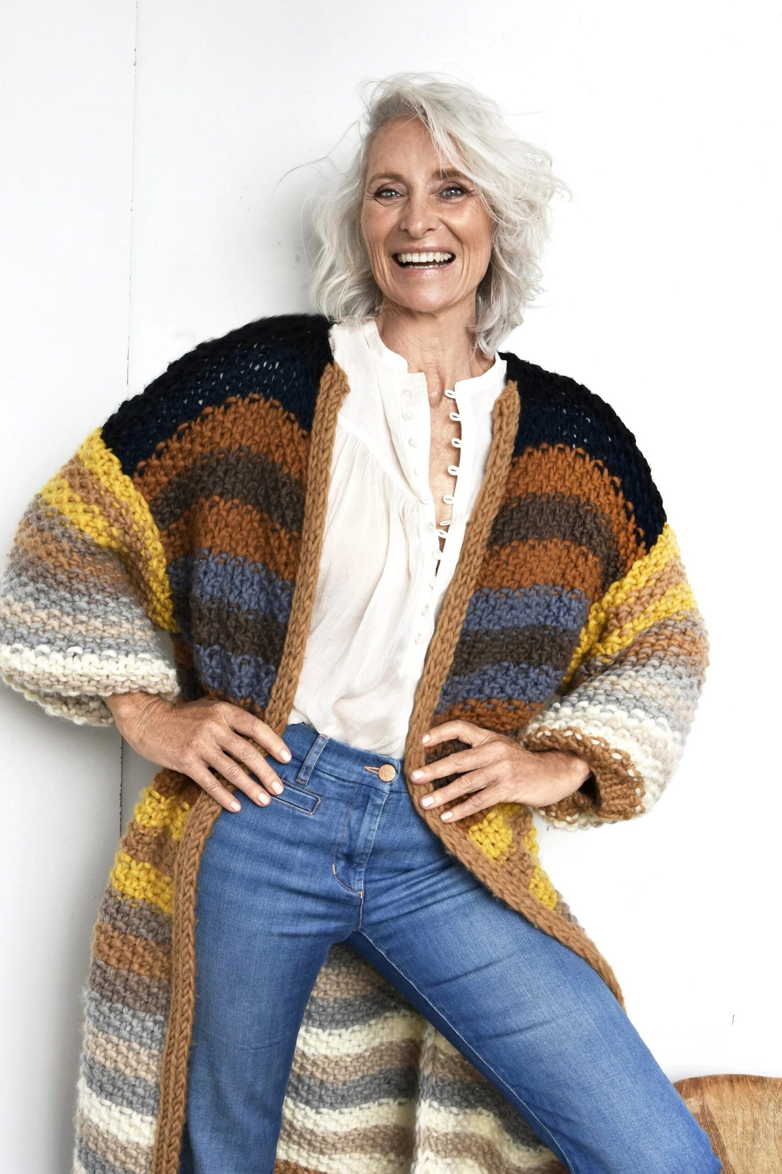 Colorful chunky striped cardigan with jeans - cozy casual outfit idea for women over 50