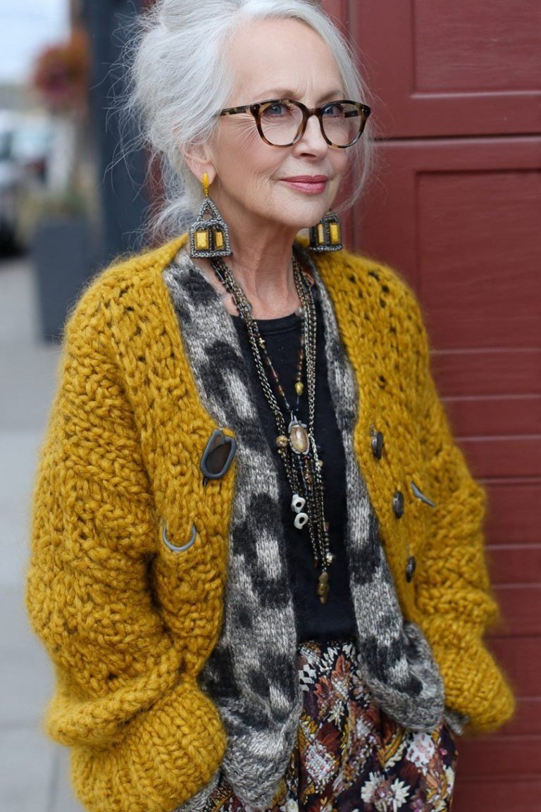 Mustard chunky knit cardigan with patterned skirt - cozy casual outfit idea for women over 50