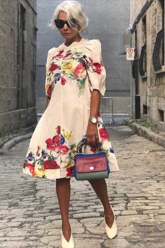 Cream midi dress with bold red and yellow floral print