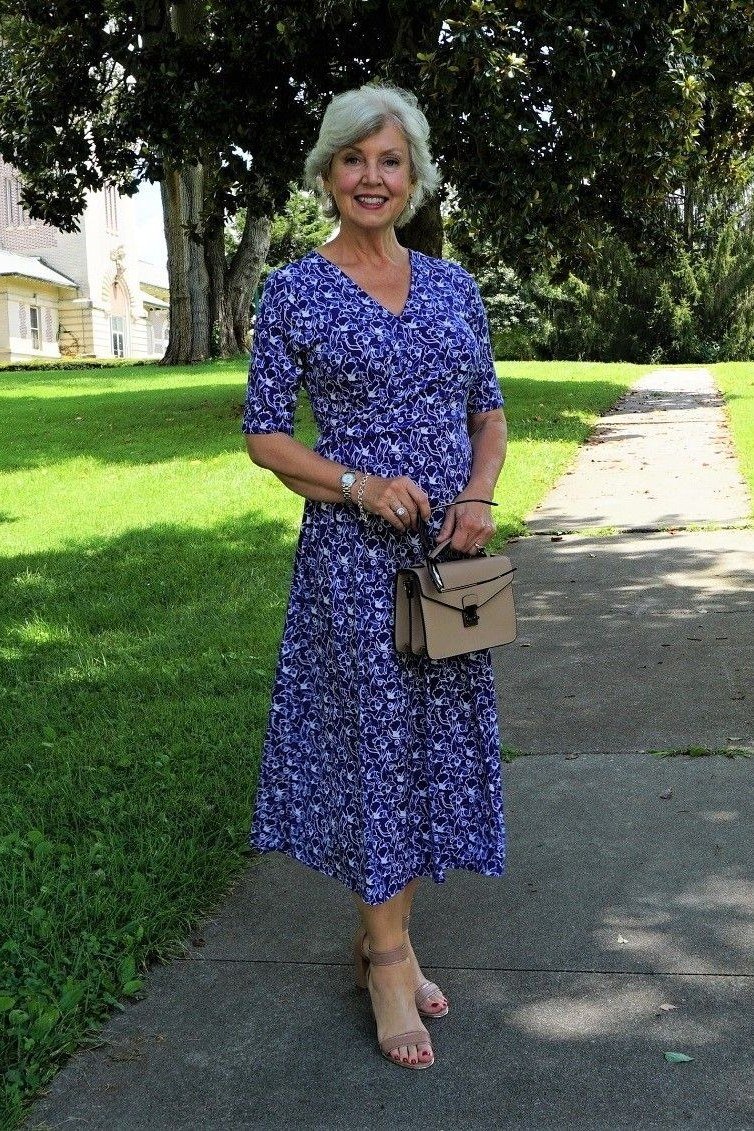 Blue floral midi dress with three-quarter sleeves on lawn