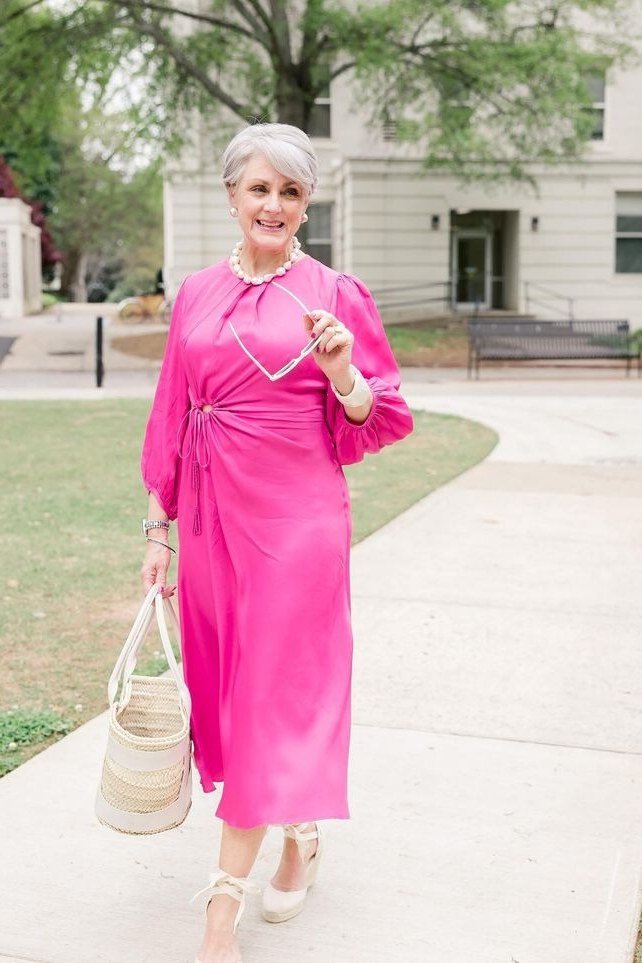 Hot pink shirt dress with collar on city street