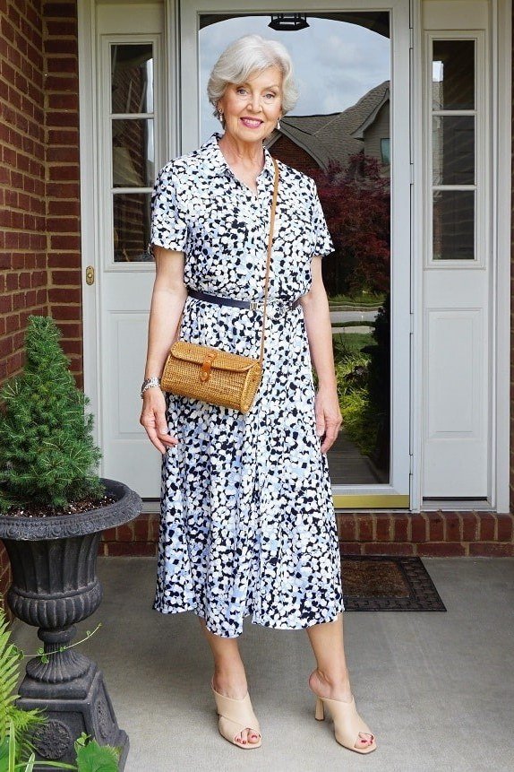 Black and white floral collared shirt dress on porch