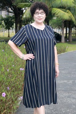Navy and white striped midi dress in park