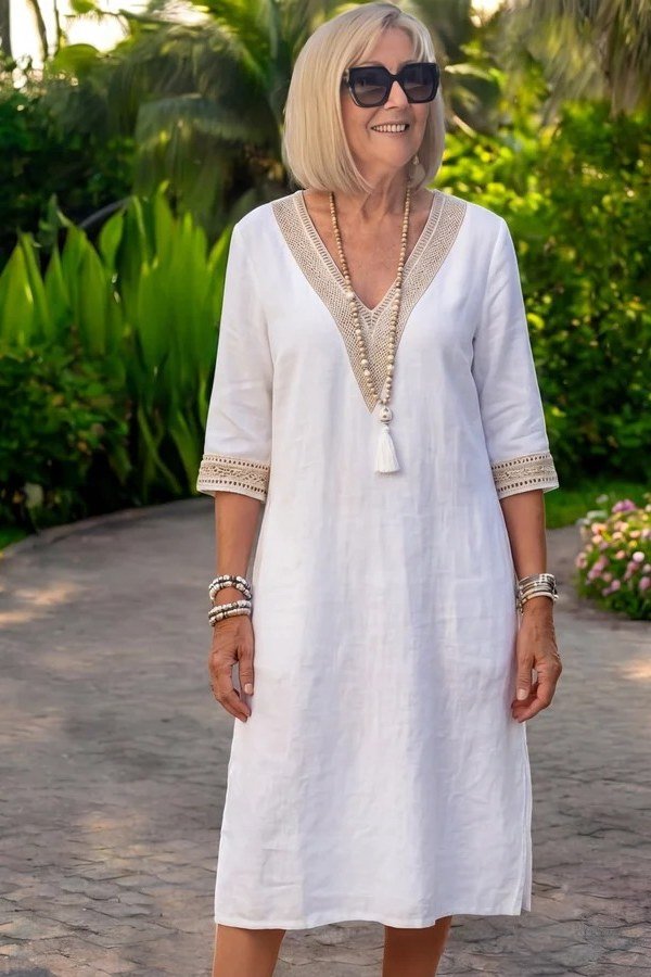 White embroidered v-neck midi dress in garden