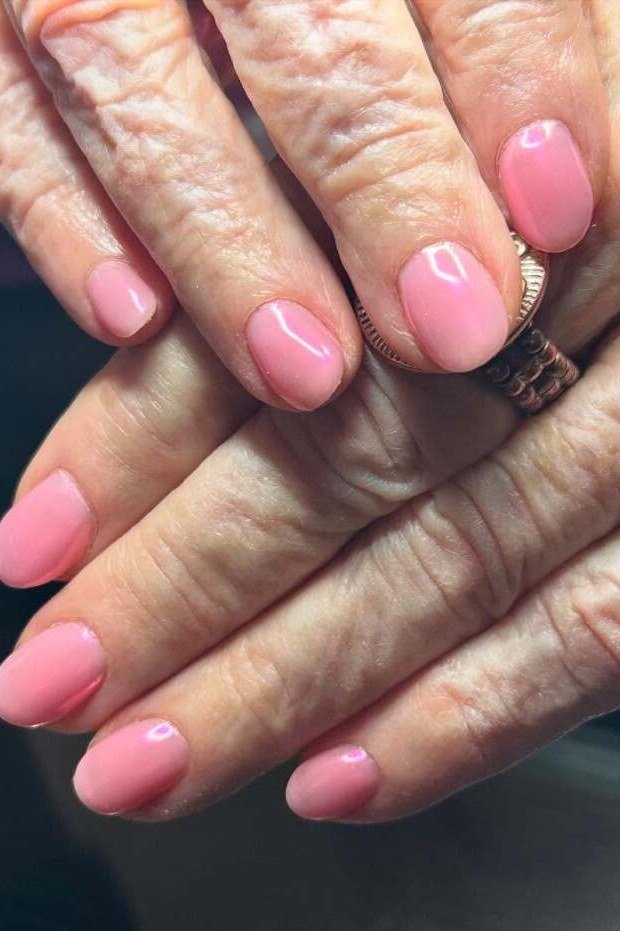 Bright Pink Short Round Nails for women over 60