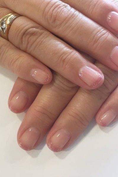 Soft Pink with Tiny Floral Accent Short Round Nails for women over 60