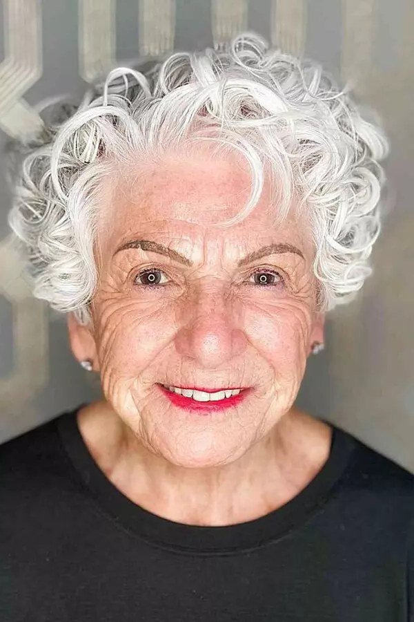 White Curly Pixie with Bangs curly bangs hairstyle for women over 60