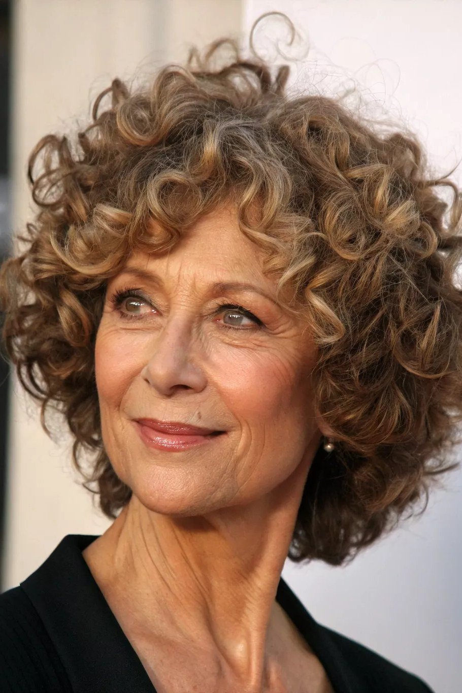Lavender-Gray Curly Crop with Bangs curly bangs hairstyle for women over 60