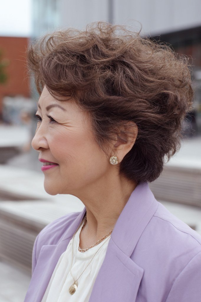 Dark Brown Curly Pixie curly bangs hairstyle for women over 60
