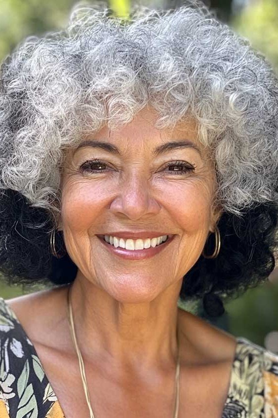 Blonde Curly Bob with Bangs curly bangs hairstyle for women over 60