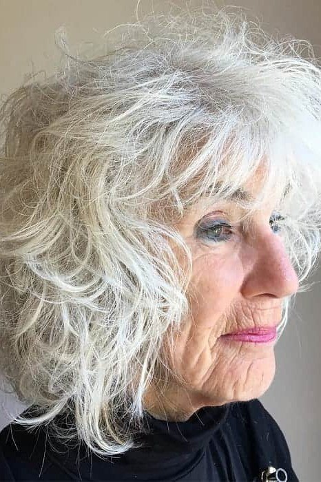 Long White Curly Hair with Bangs curly bangs hairstyle for women over 60