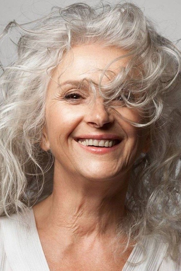 Silver white shoulder length curls for women over 60