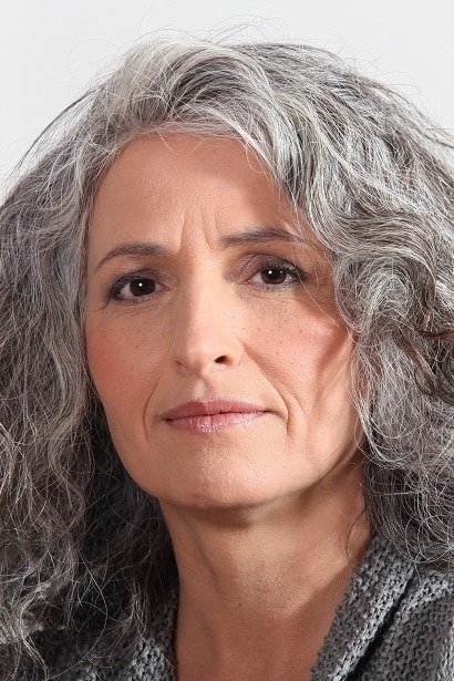 Soft silver gray shoulder curls for older women